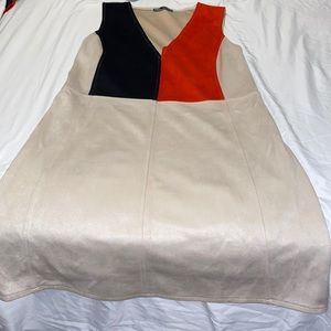 tan v-neck dress with red/black color-block